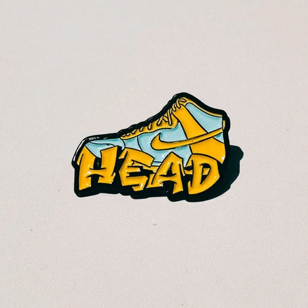 Sneaker pin reading Sneaker Head